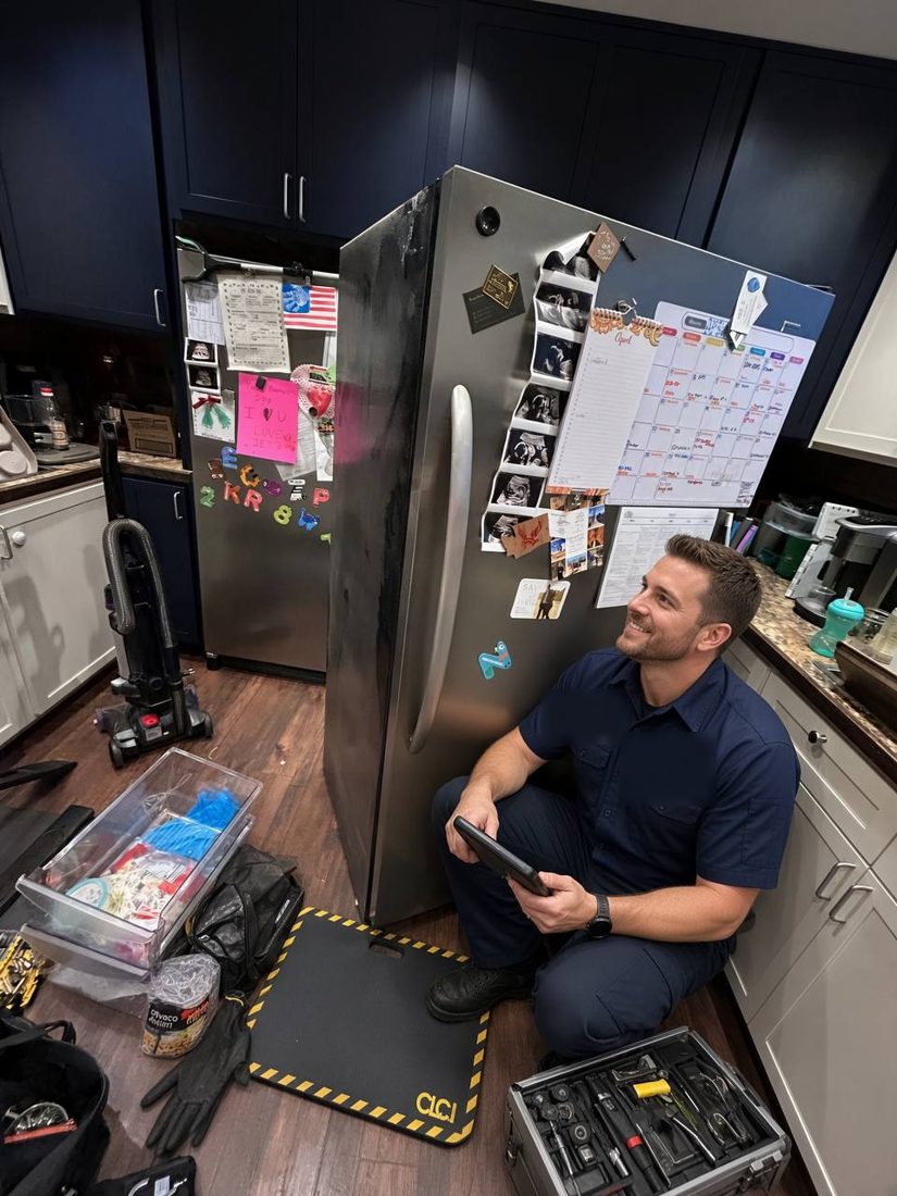 FastFix technician running diagnostics at a refrigerator ice maker in the Tri-Cities